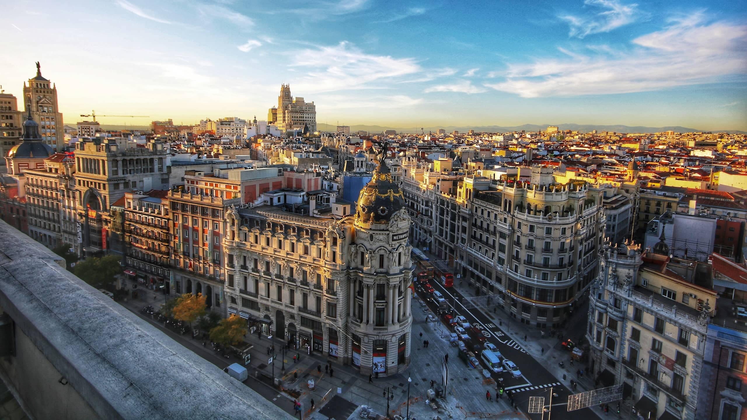 Madrid’s Gran Vía and the Metrópolis building at dusk